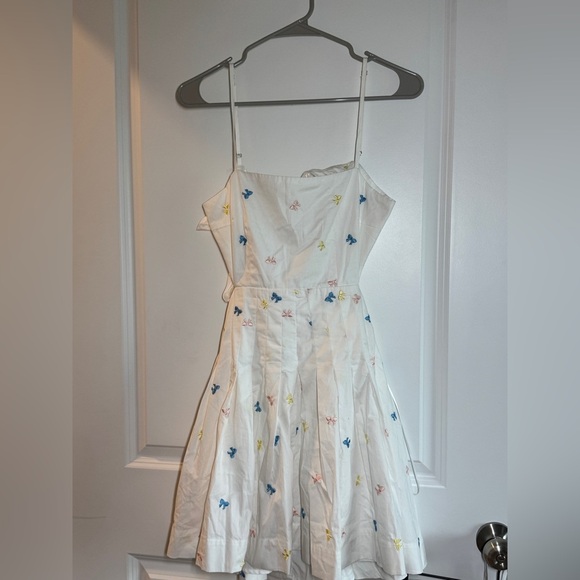 Chic White Backless Dress with Spaghetti Straps - Picture 4 of 13